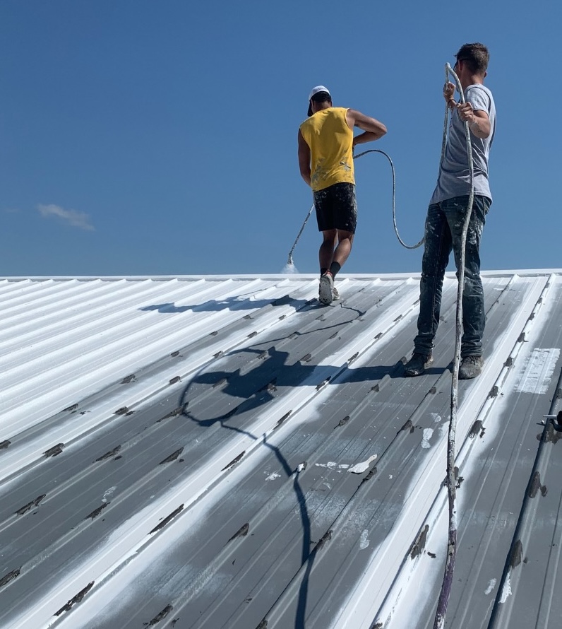 Roof Tech LLC team and commercial roofing project