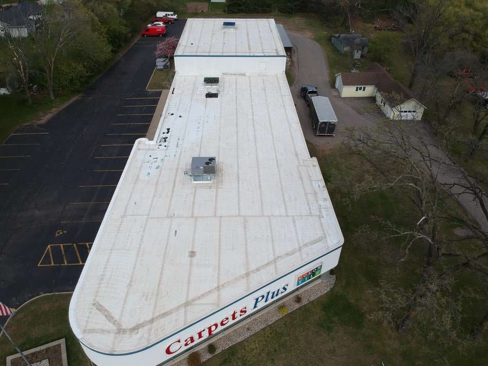 Fabric reinforced membrane before restoration showing deteriorated condition requiring professional restoration services