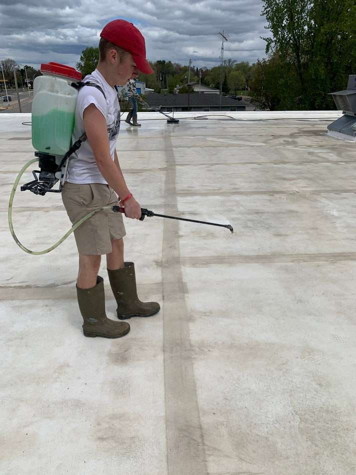 Thorough preparation work for fabric reinforced membrane restoration demonstrating professional standards and quality control