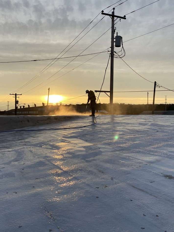 Thorough membrane cleaning by Roof Tech LLC professionals preparing surface for restoration coating system