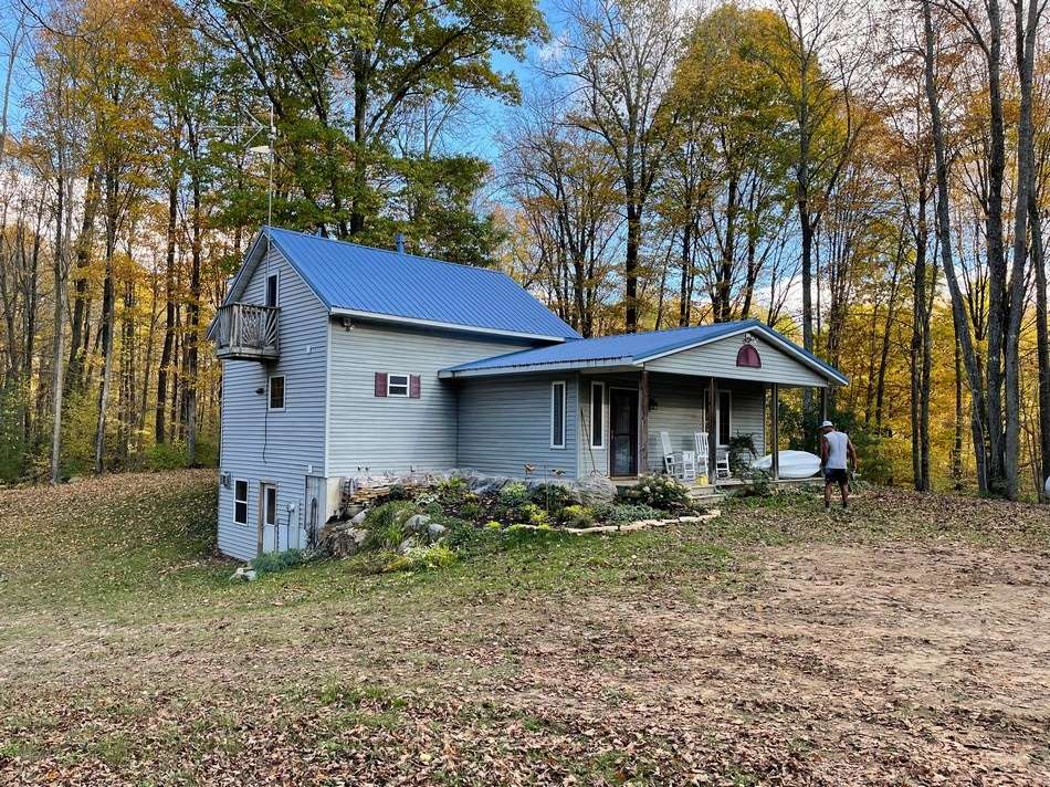 Completed metal roof restoration project demonstrating superior coating application and weather protection