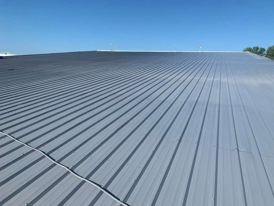 Professional metal roof restoration demonstrating superior coating system and long-term protection