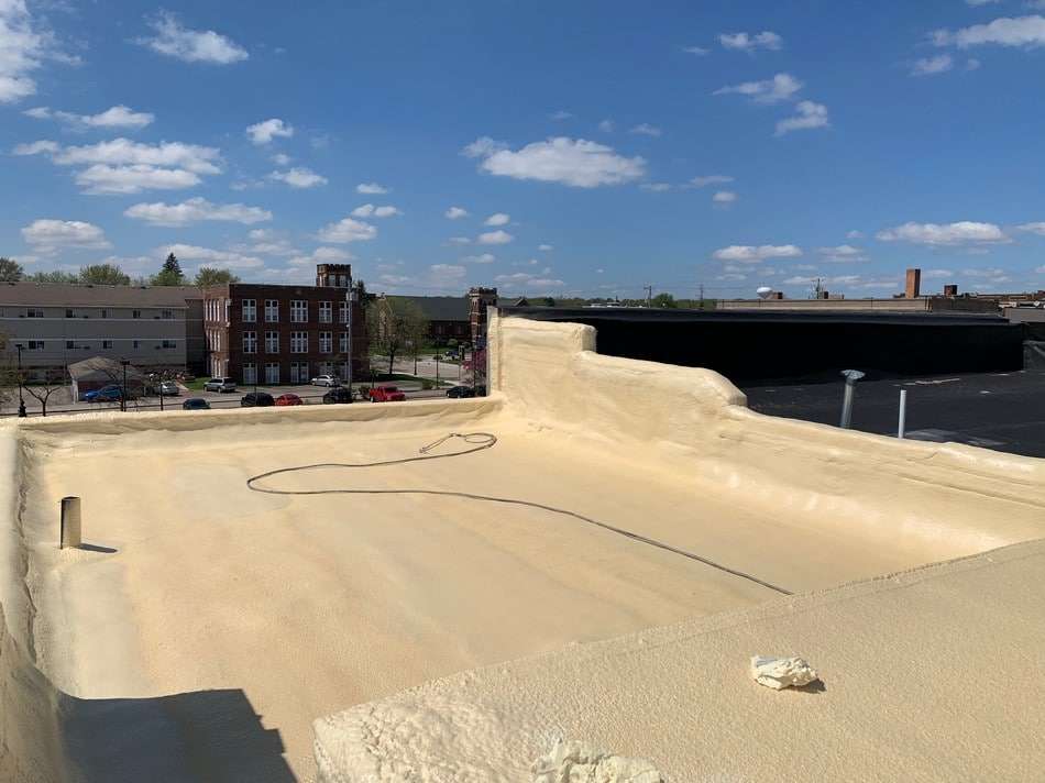 Professional spray foam installation demonstrating seamless application and superior weather resistance capabilities