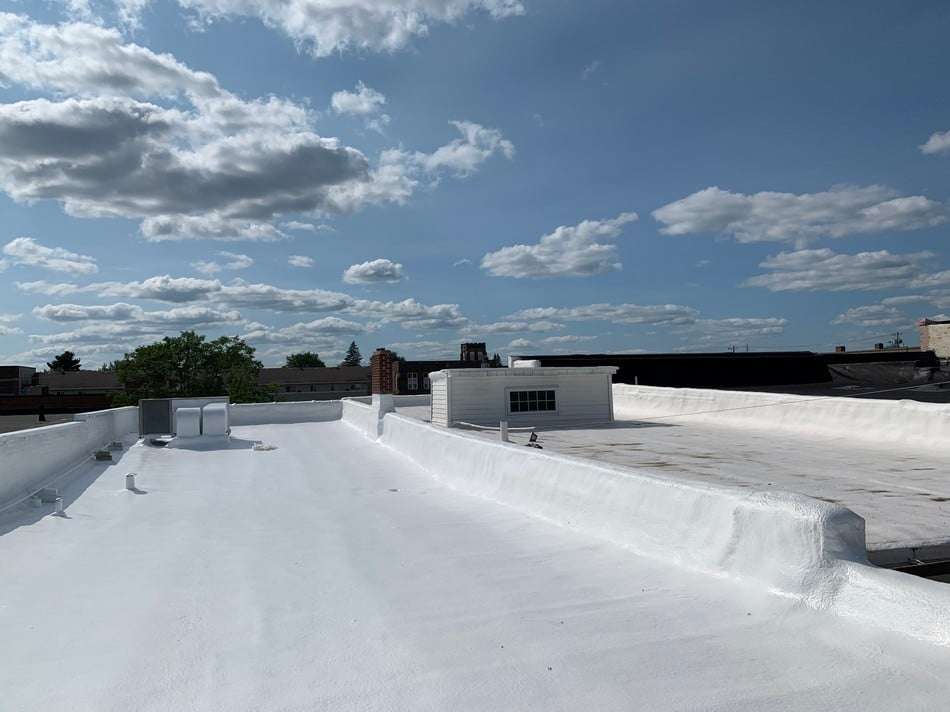 Completed spray foam roofing project by Roof Tech LLC demonstrating seamless finish and superior weather protection