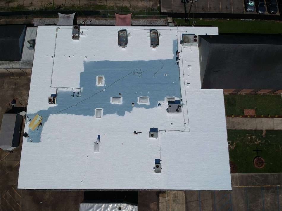Professional spray foam roofing installation showcasing quality workmanship and energy-efficient insulation system