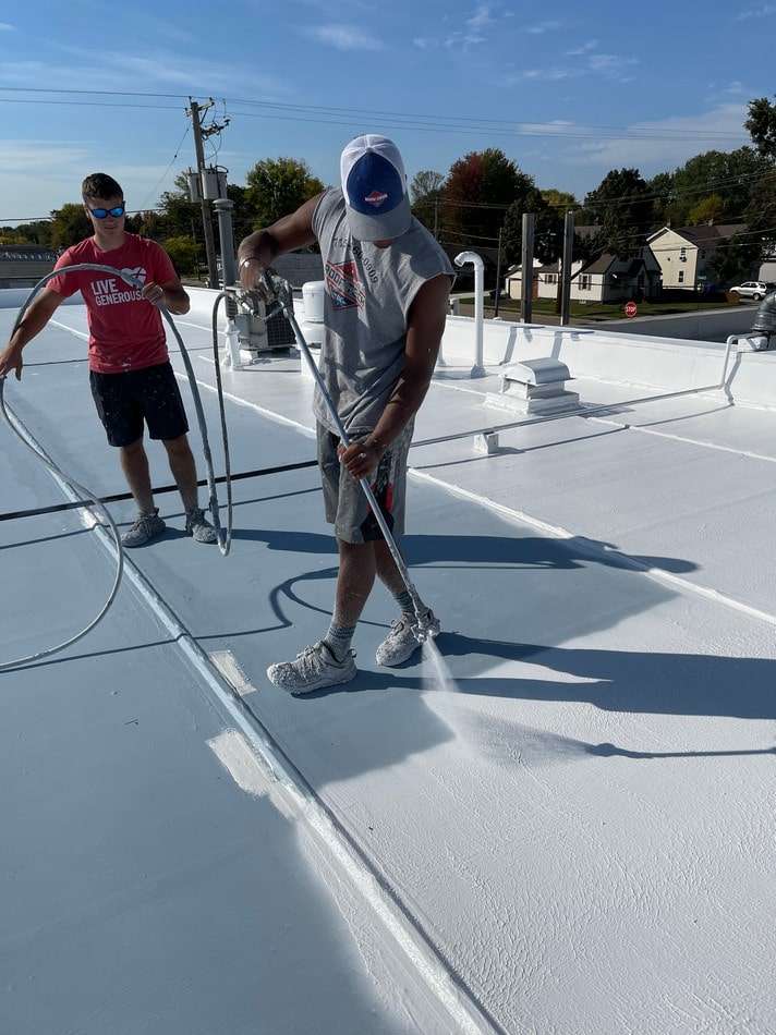 Commercial membrane roof restoration work in progress showing professional techniques by Roof Tech LLC Wisconsin